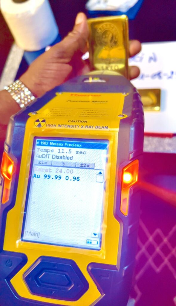 A MOUHDJAF 24-karat gold bar verified by a mass spectrometer reading Au 99.99, 24.00 karat